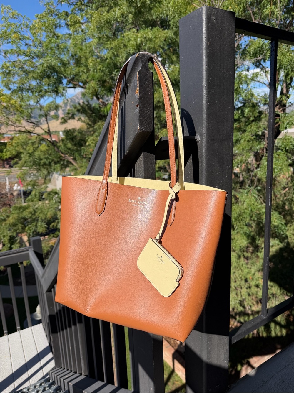 Kate Spade New York Ava Reversible Leather Tote in tan & cream